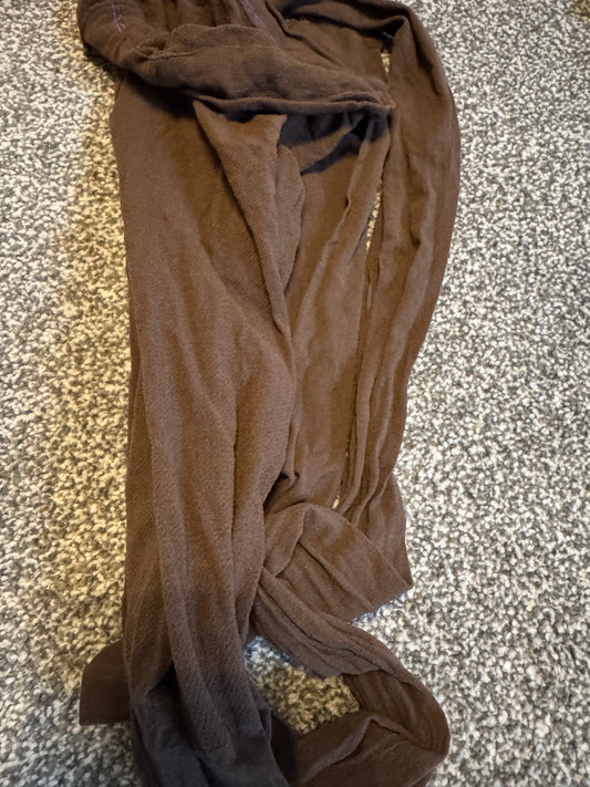 Worn dark brown tights