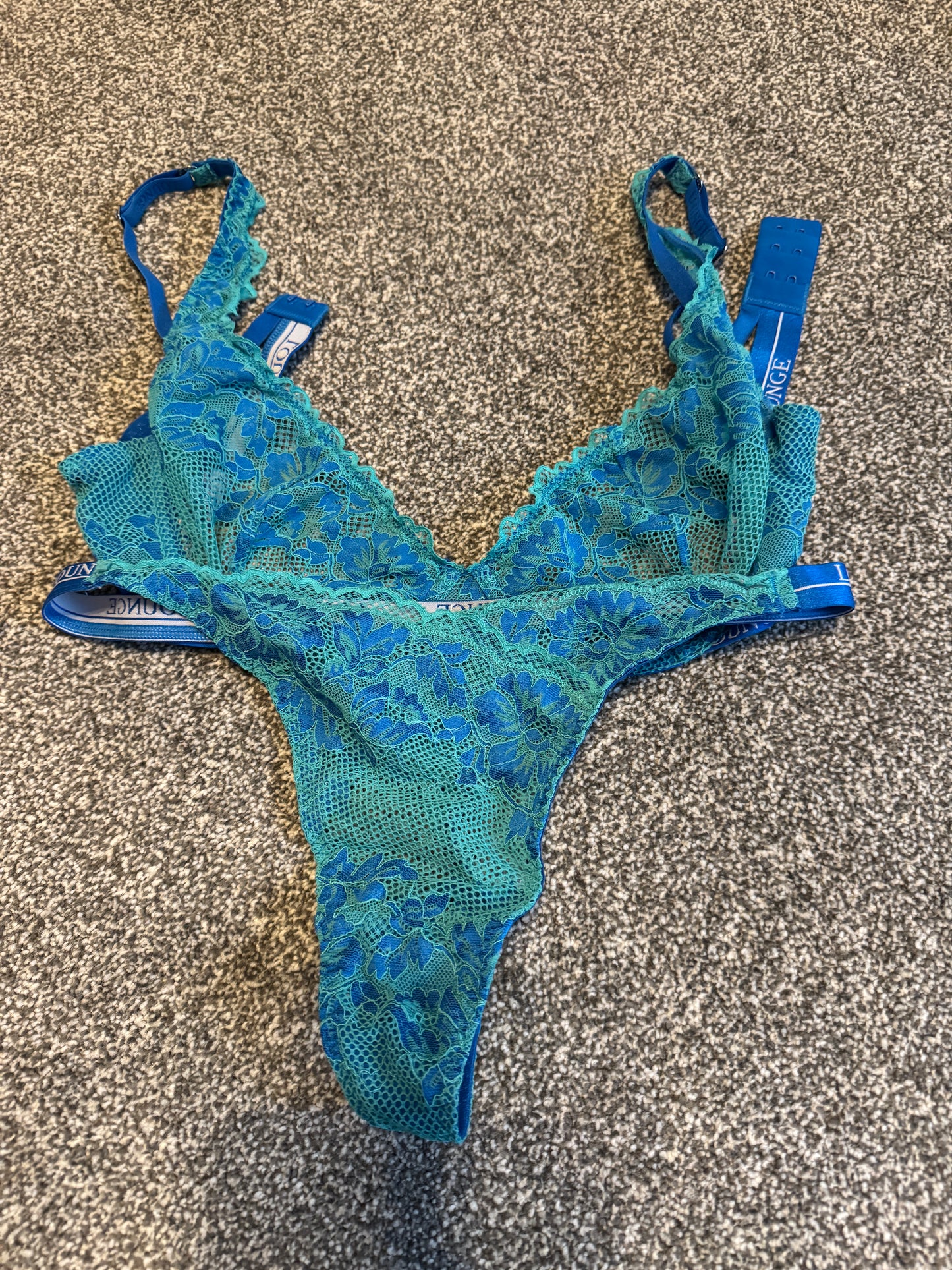 Worn blue and green bra and panty set