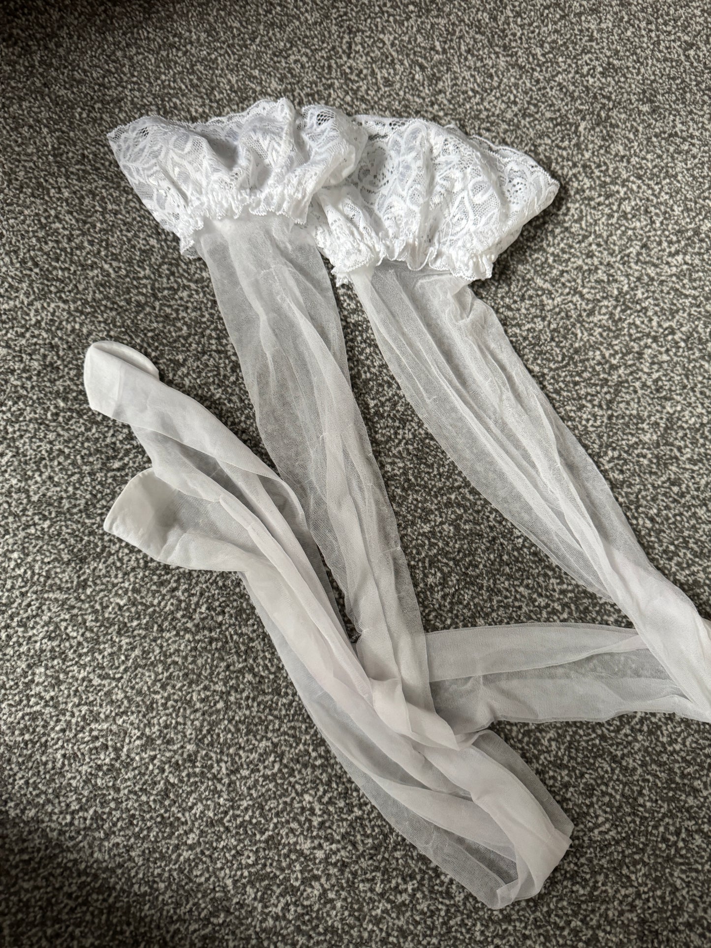 1 pair worn white hold ups