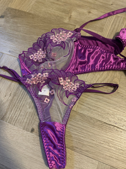 Worn purple lace bra and thong set