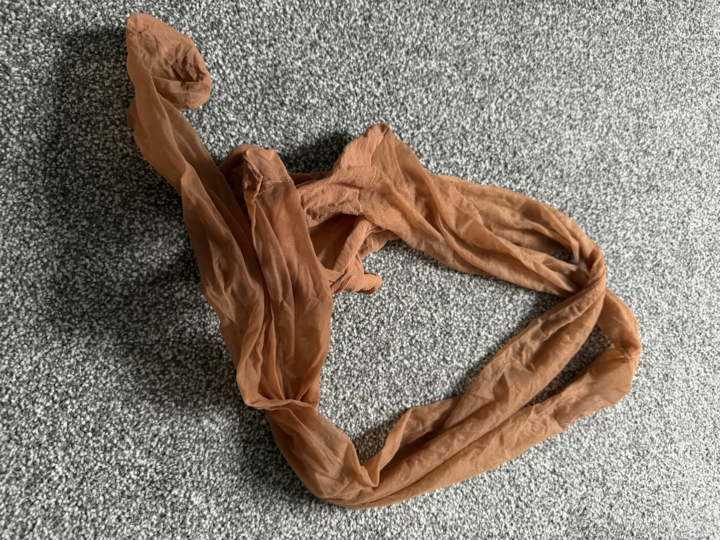 Soft golden pantyhose worn